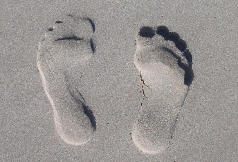 Barefoot imprint on the beach