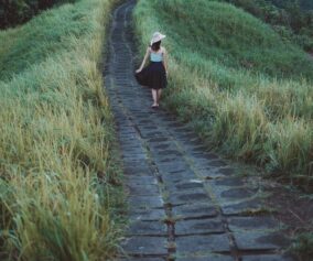 barefoot walking woman