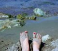 feet on the beach