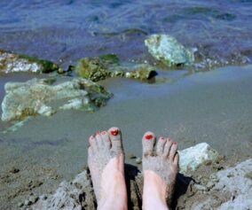 feet on the beach